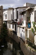 The torrential Barada river flows through Damascus